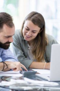 Homeowners reviewing flood insurance rates and savings after receiving a Flood Elevation Certificate in Philadelphia

