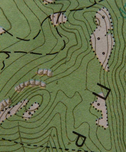Topographic map close-up with contour lines that illustrate how LiDAR mapping helps show changes in elevation for drainage analysis