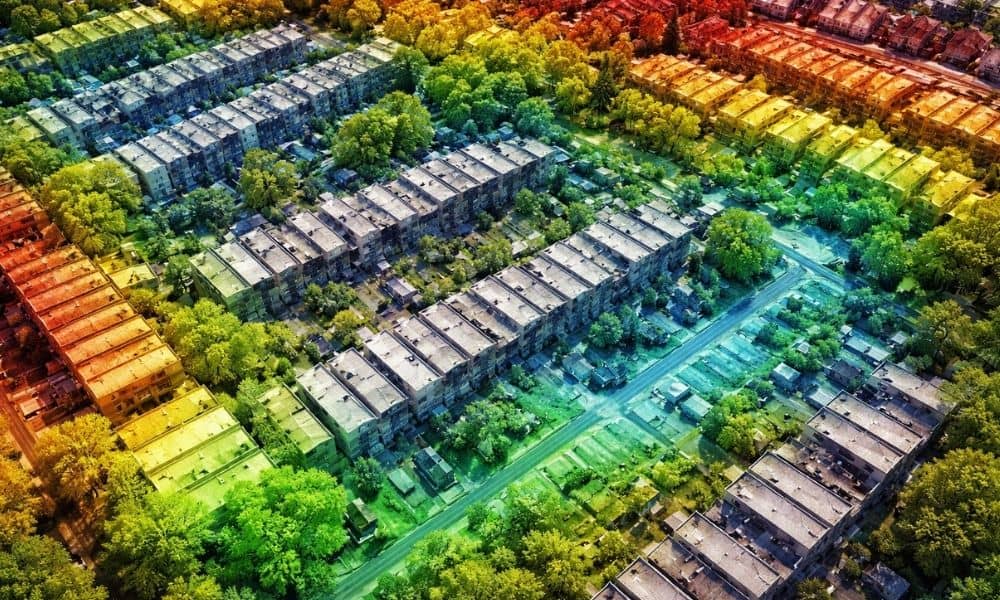 LiDAR mapping showing elevation differences across a dense residential property with subtle slope variations visible