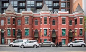 Brick row building with storefronts and adjacent properties relevant to a loan closing survey