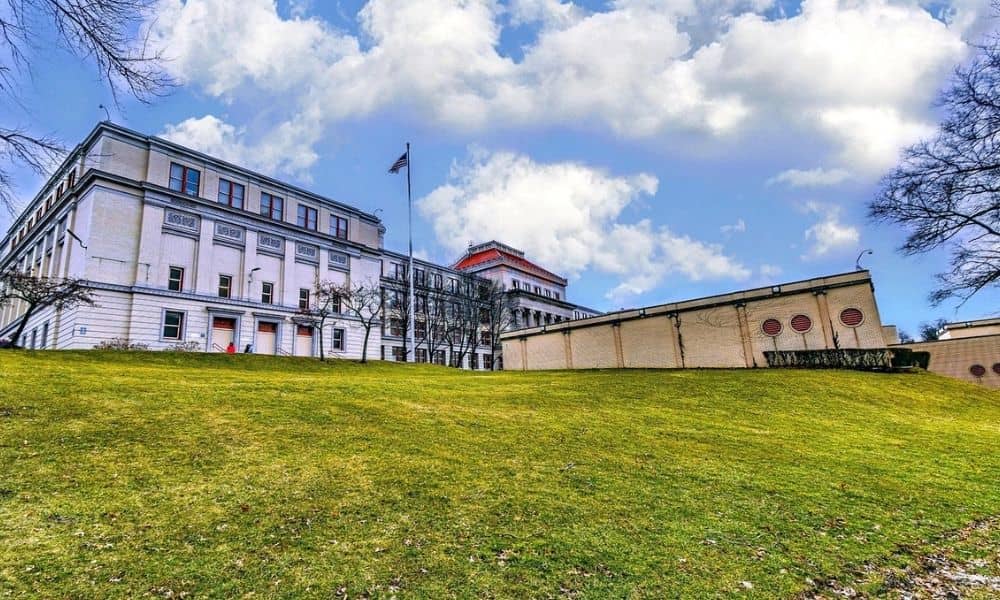 Historic Pittsburgh school campus with sloped grounds relevant to due diligence survey planning